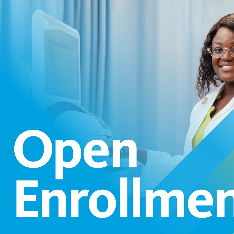 An African American woman dressed in a lab coat on an open enrollment banner for UC