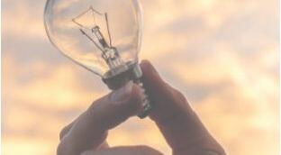 lightbulb in someones hand
